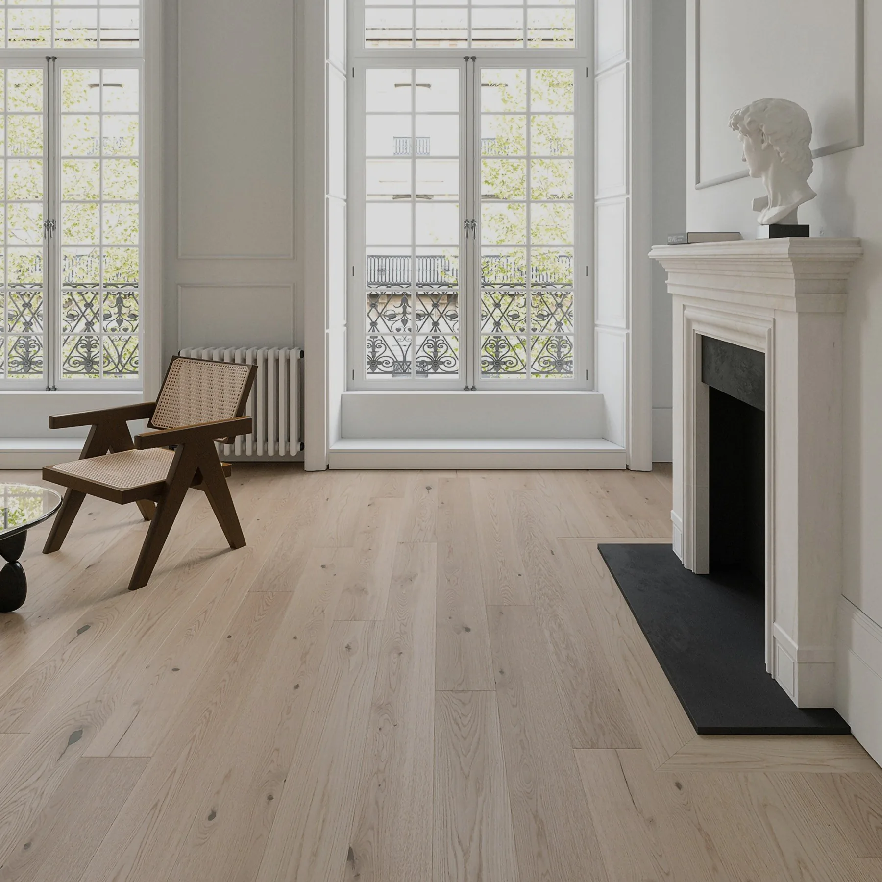A living room with an engineered board floor