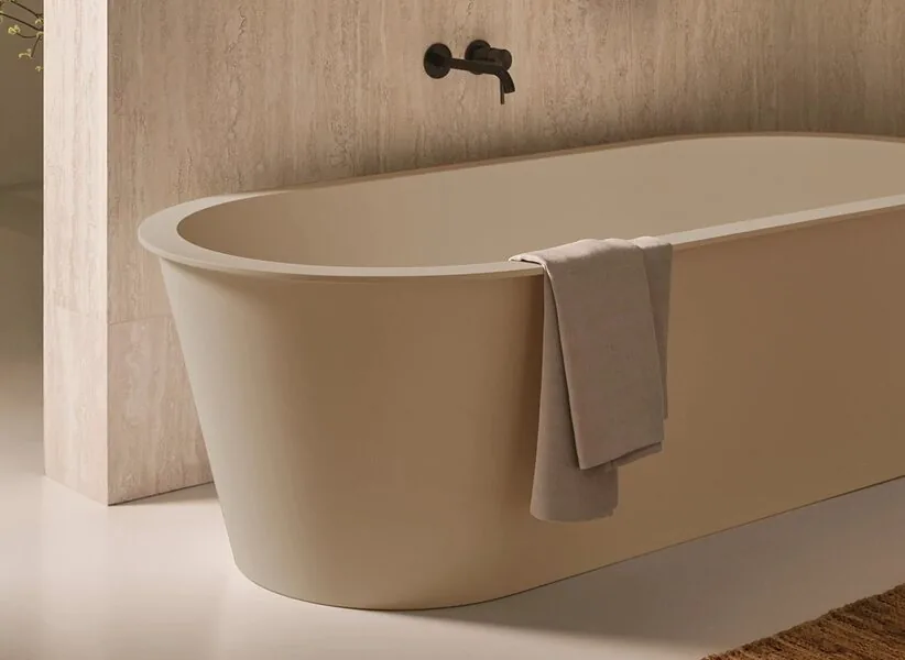 A freestanding bath in travertine