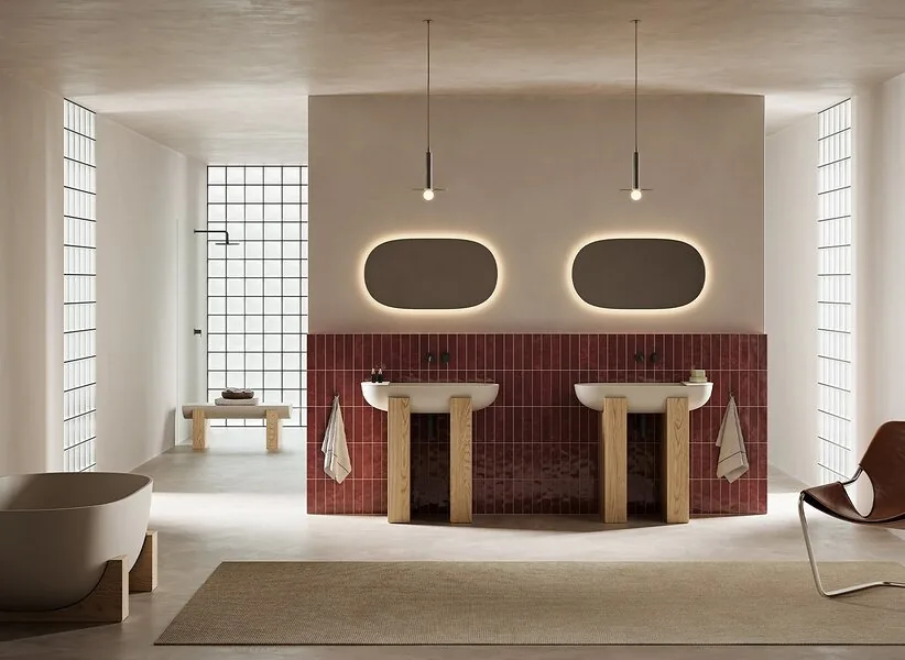 Round mirrors and a coloured wall