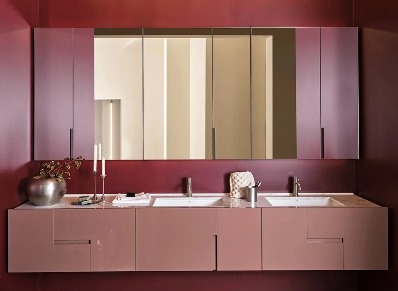 A made-to-measure vanity and coloured sanitaryware