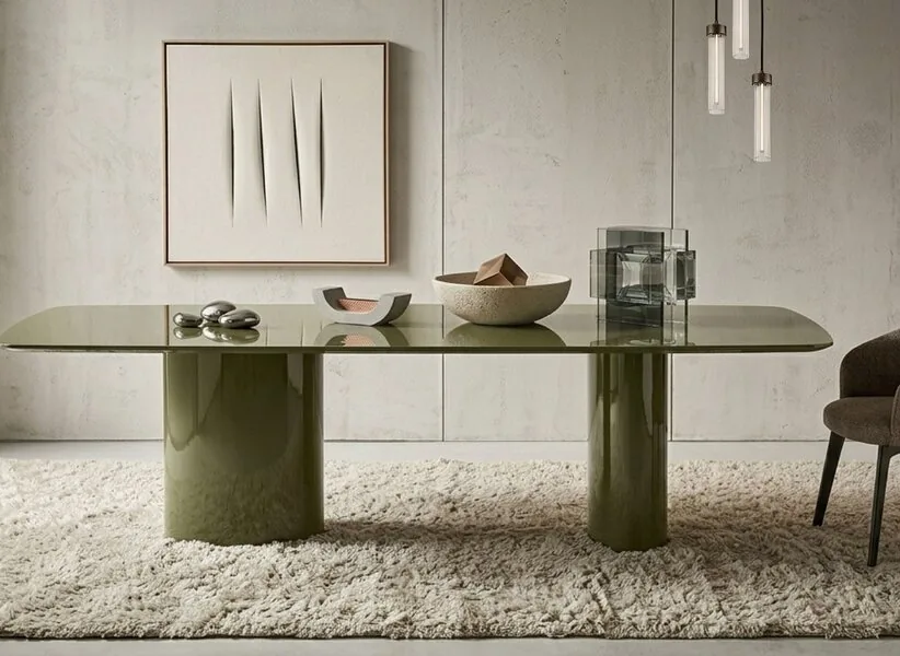A table, chairs and a pendant above