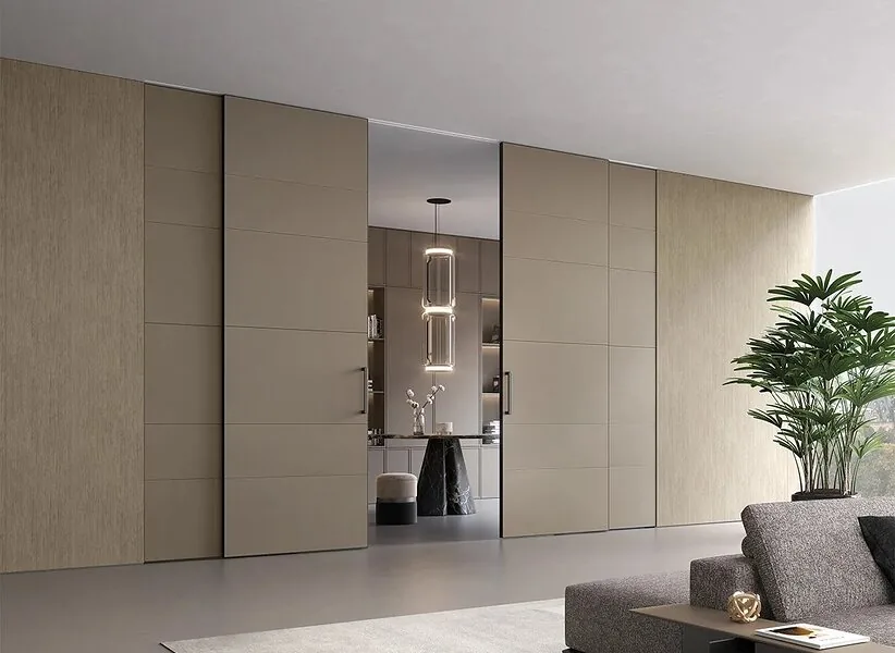 A panelled wall with a concealed door