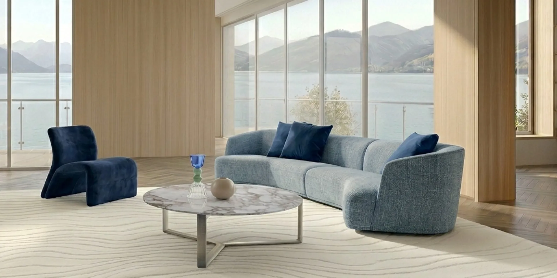 Sofá y butaca de Casamilano en un salón con vistas al lago