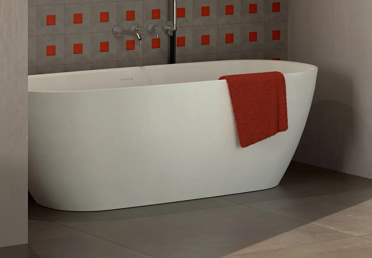 Bañera exenta Play con grifo mural.