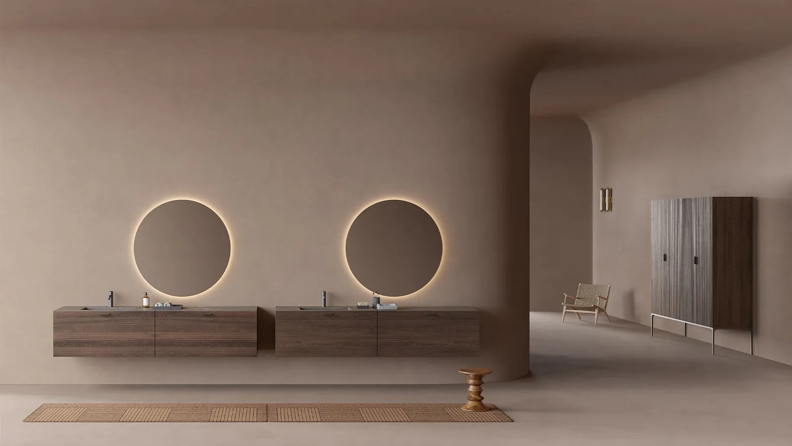 Colección Grate: dos muebles suspendidos y espejos redondos con luz.