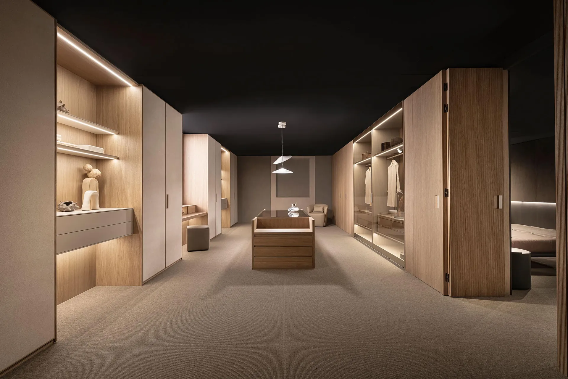 Two Kate 43 suspension pendants above the island in a dressing room on the Giellesse stand