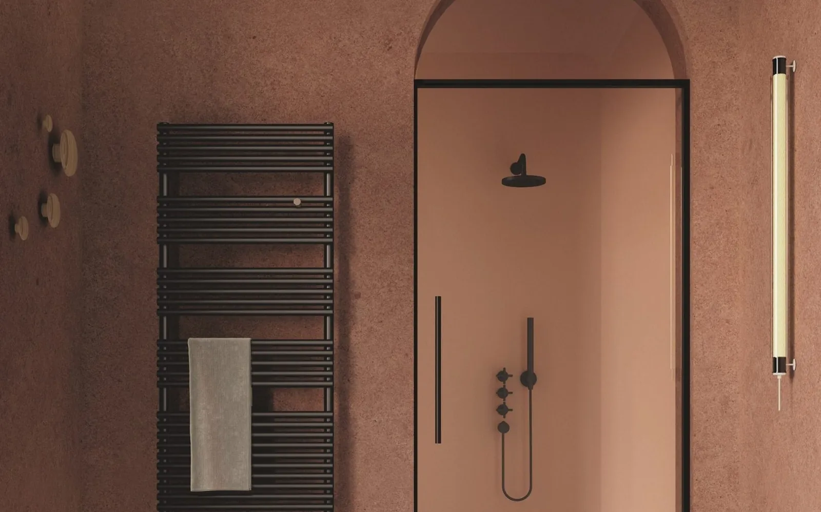 Radiador Basics 25 en un baño: en los tubos inferiores se seca una toalla.