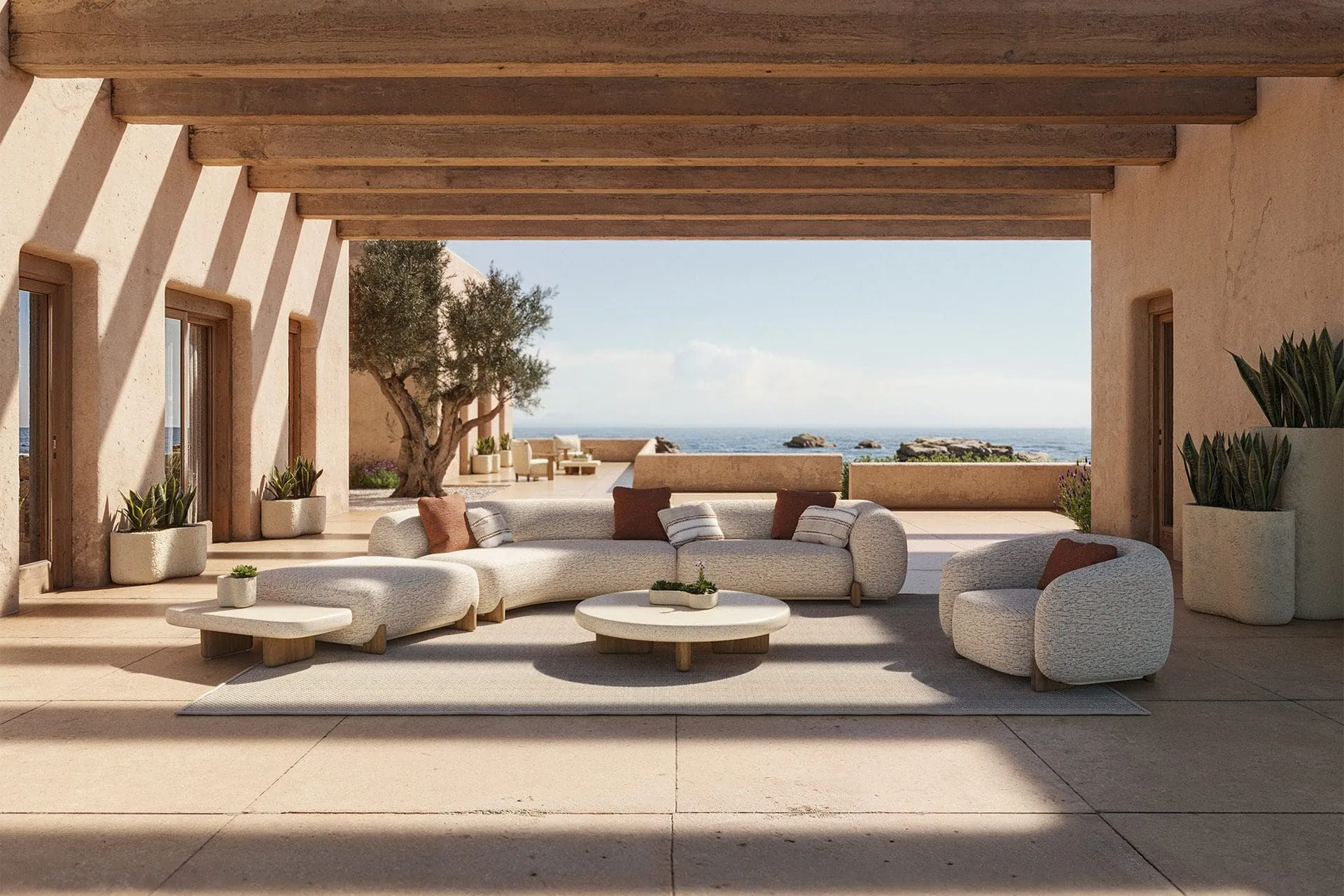 Sofás modulares Vondom Milos en una terraza con vistas al mar