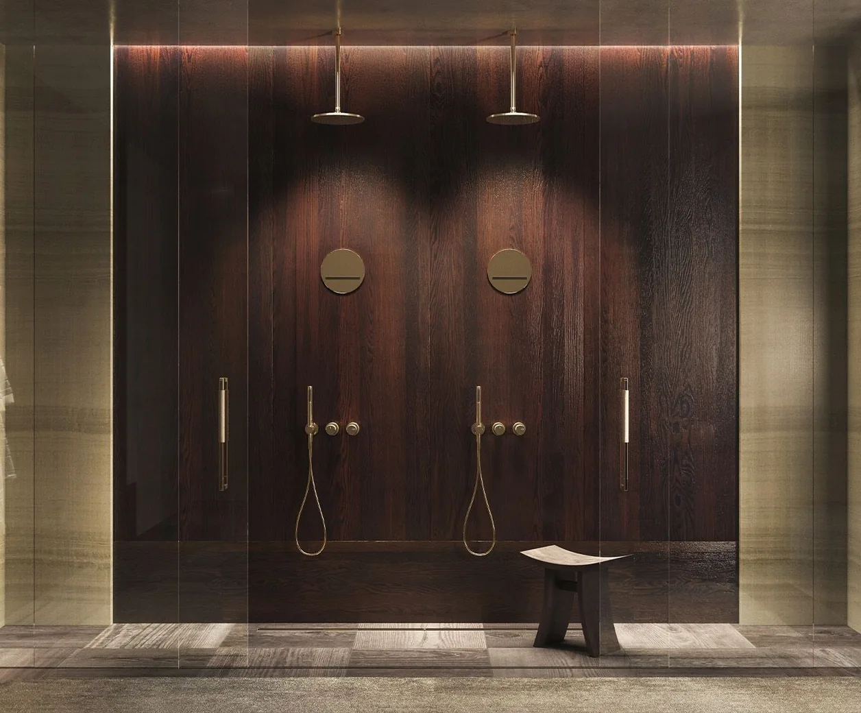 Double shower in a brass finish against dark wood